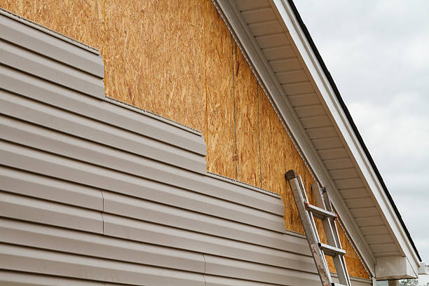 Professional Emergency Siding Repair technician working in Grove City, PA
